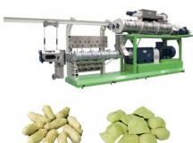 Twin screw extruder for producing textured soy protein