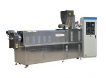 Twin screw extruder for producing puff snack food machine