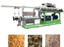 Twin screw extruder for producing soy chunks food