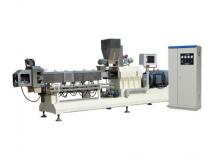 Twin screw extruder for corn flakes machine