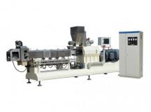 Twin screw extruder for producing dog food